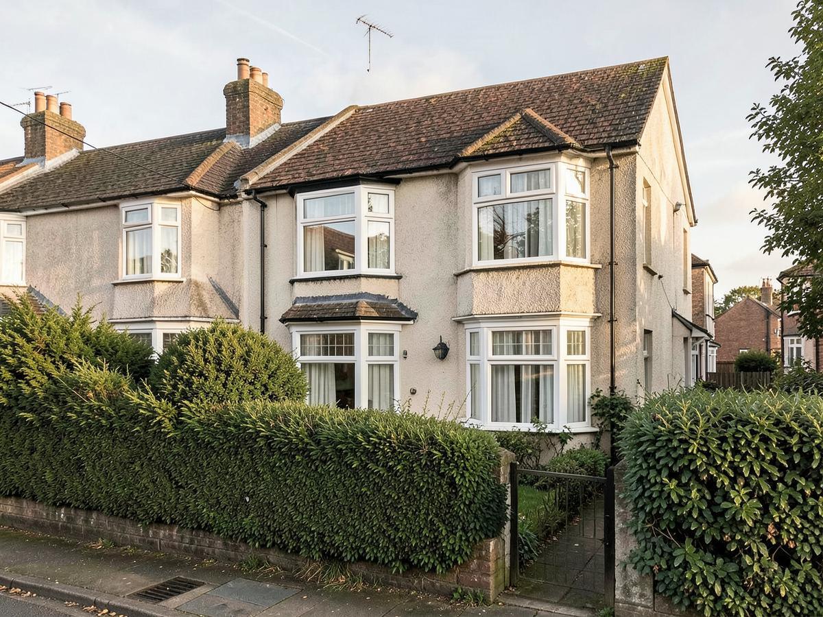 1930s rendered semi-detached house with bay windows
